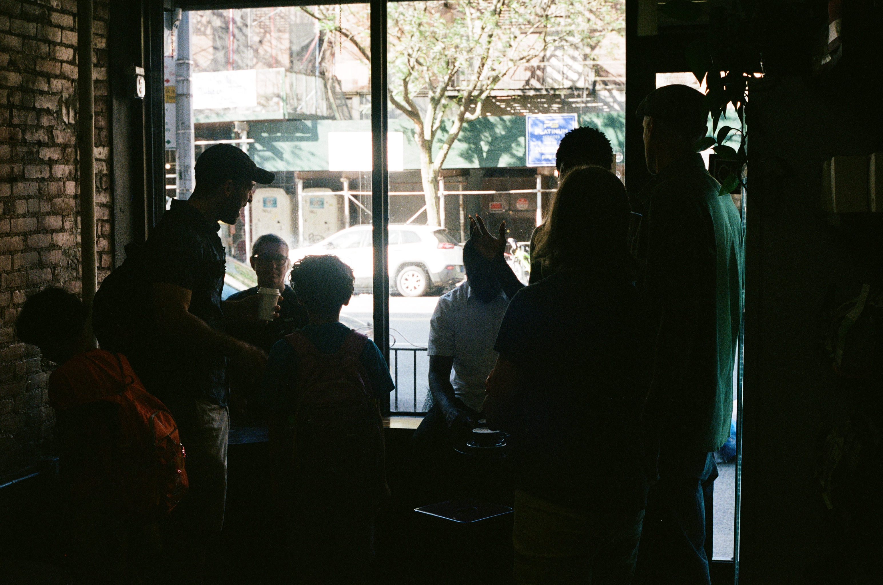 A photo of people talking inside Sojourner.